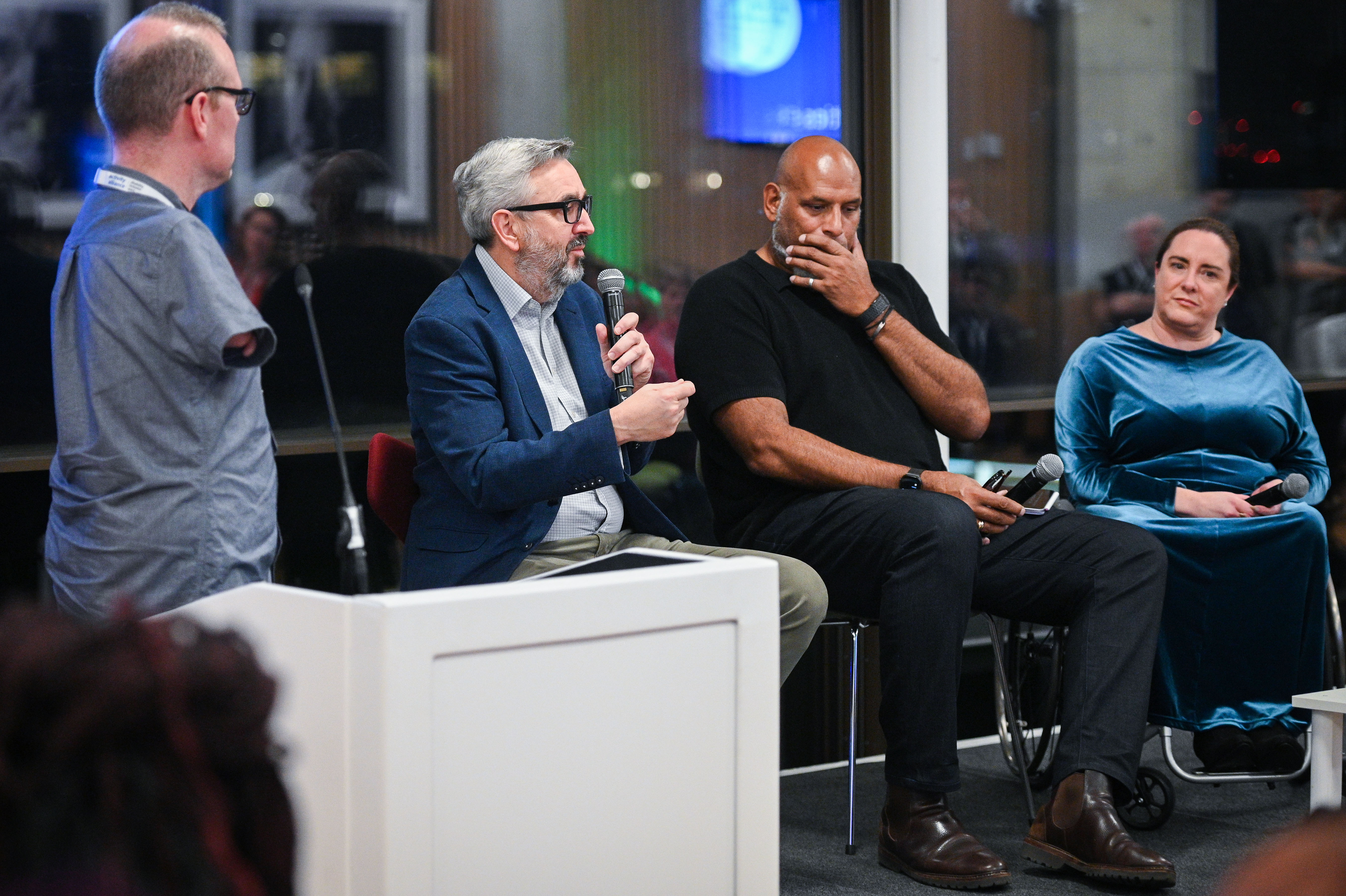 Andy Stevenson, Tim Hollingsworth, John Amaechi and Sarah Brown-Fraser sitting on stage